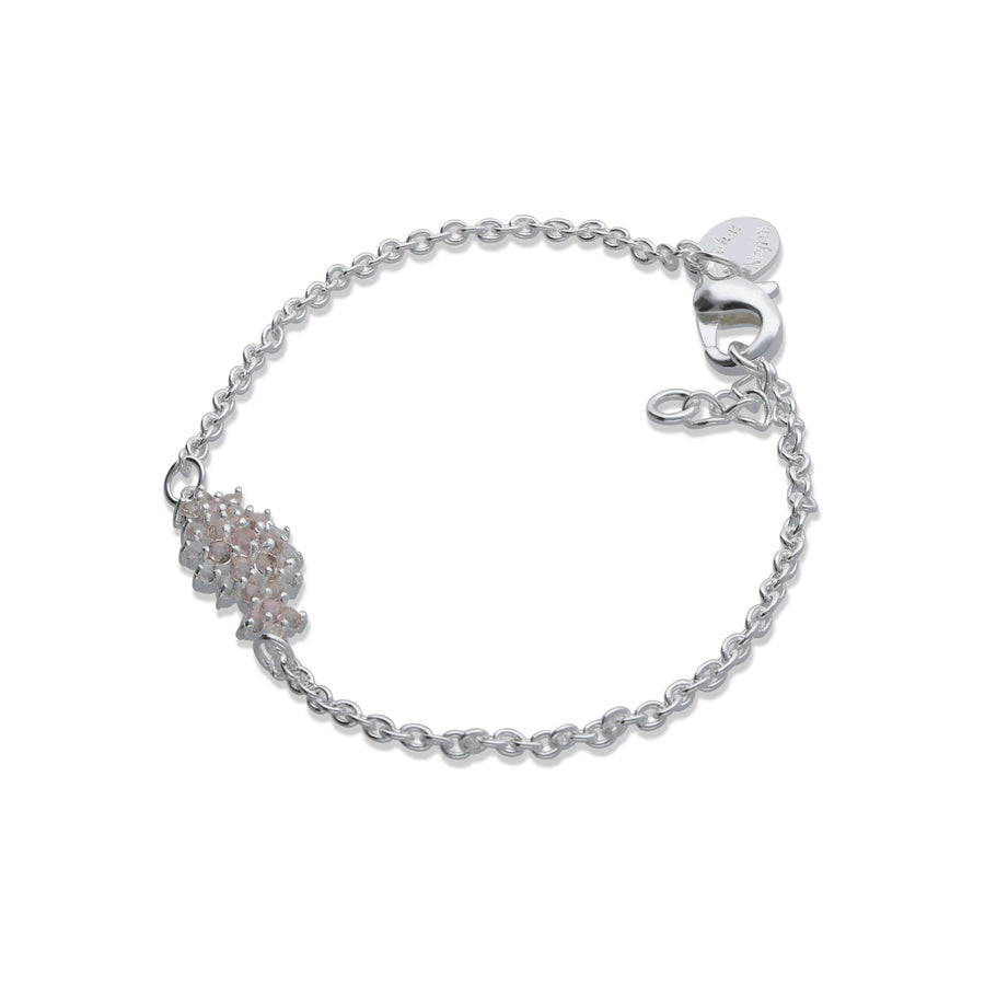 A floral rhombus bracelet studded with champagne colored crystal stones