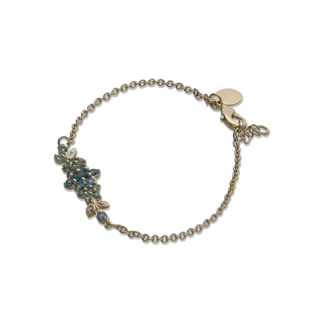 A medium flowering branch bracelet inlaid with turquoise crystal stones