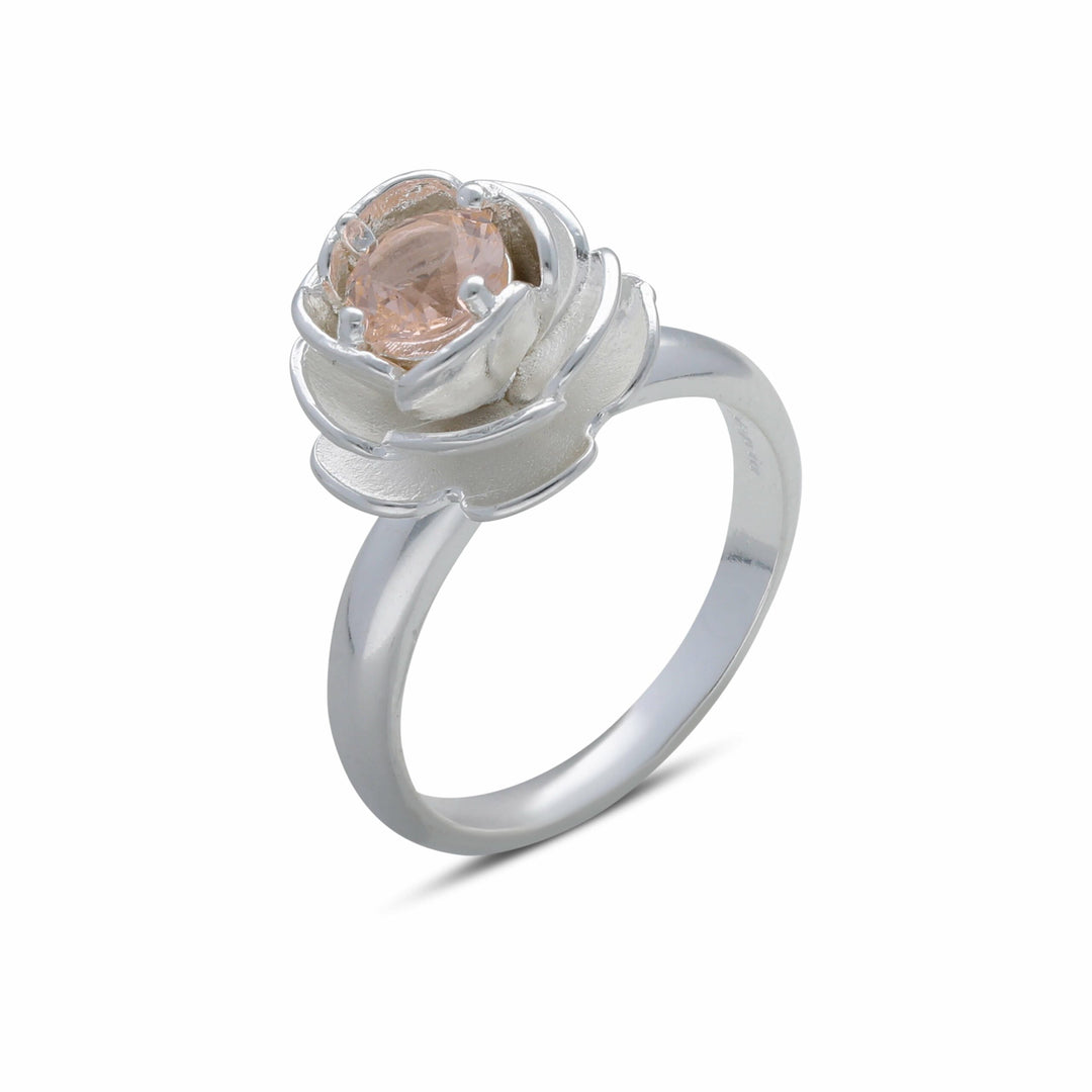 Rose ring studded with a champagne-colored crystal stone