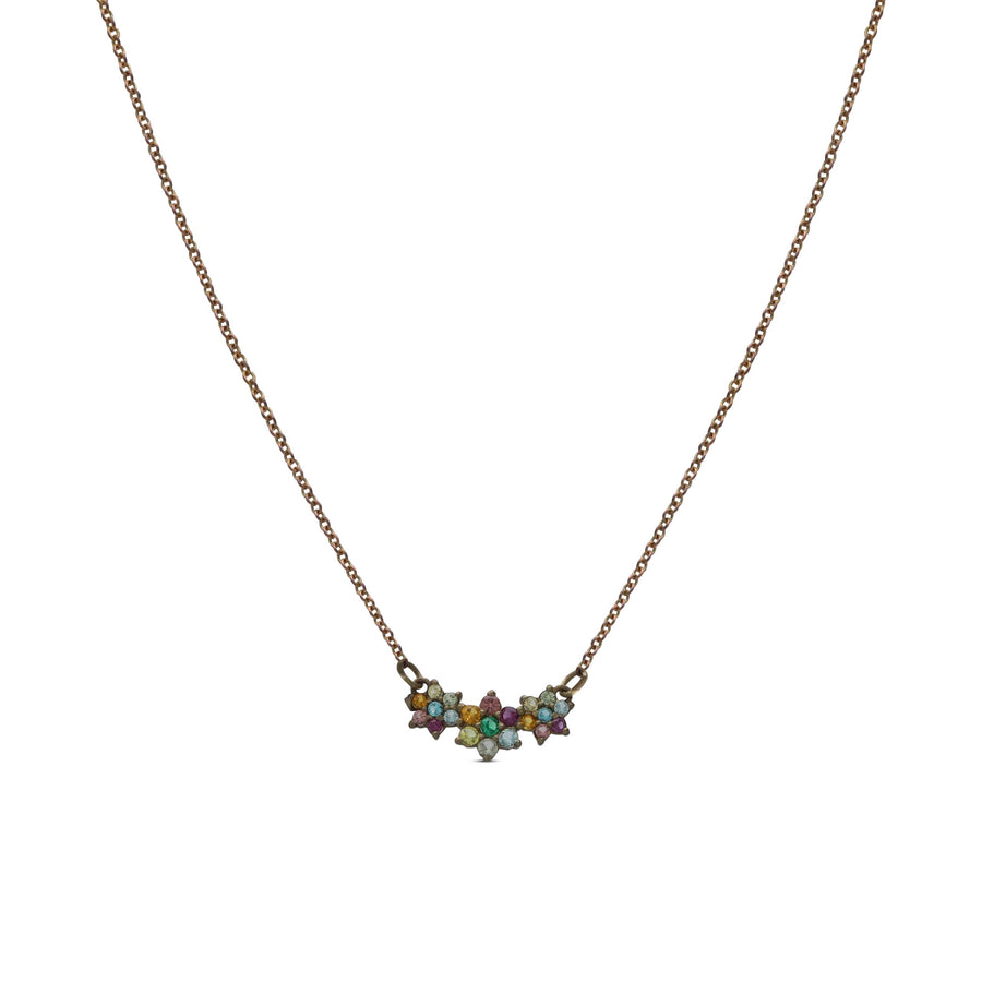 The three flower necklace is studded with colored crystal stones
