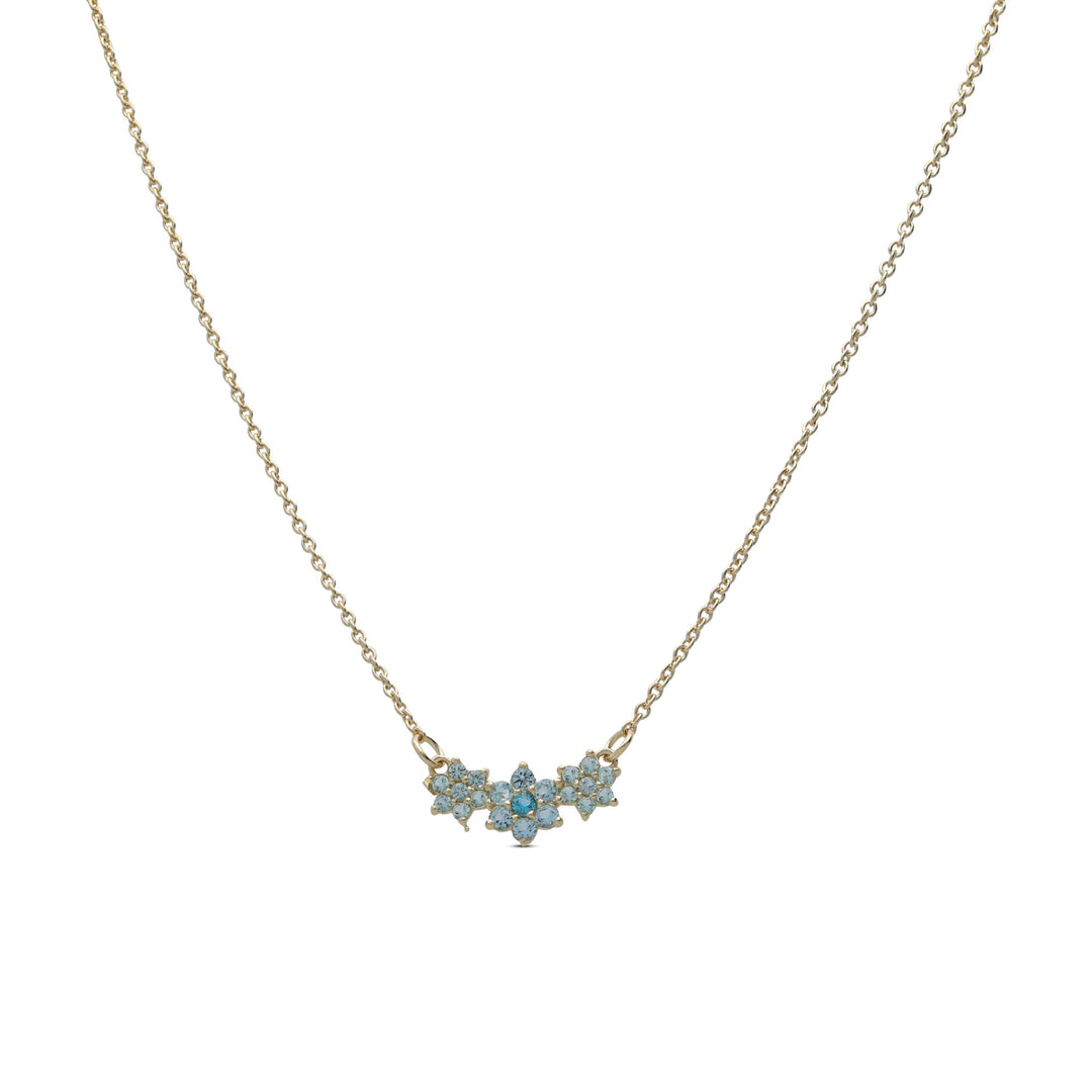 The three flower necklace is studded with turquoise crystal stones