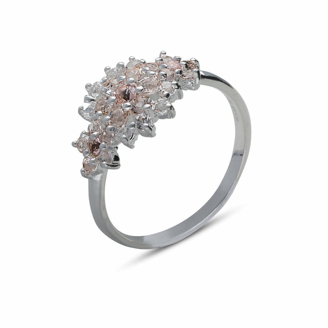 A floral rhombus ring studded with champagne colored crystal stones