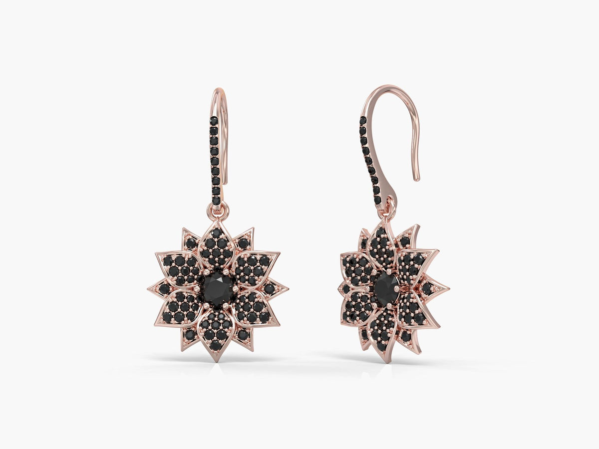 Amaryllis dangling earrings studded with zircons