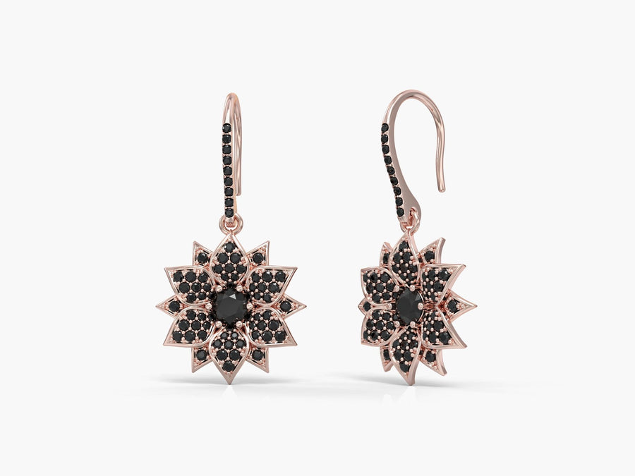 Amaryllis dangling earrings studded with zircons