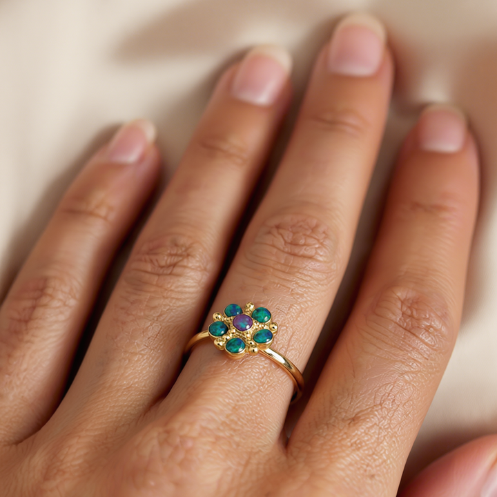 Bloom - A flower ring set with blue-purple lab opal stones