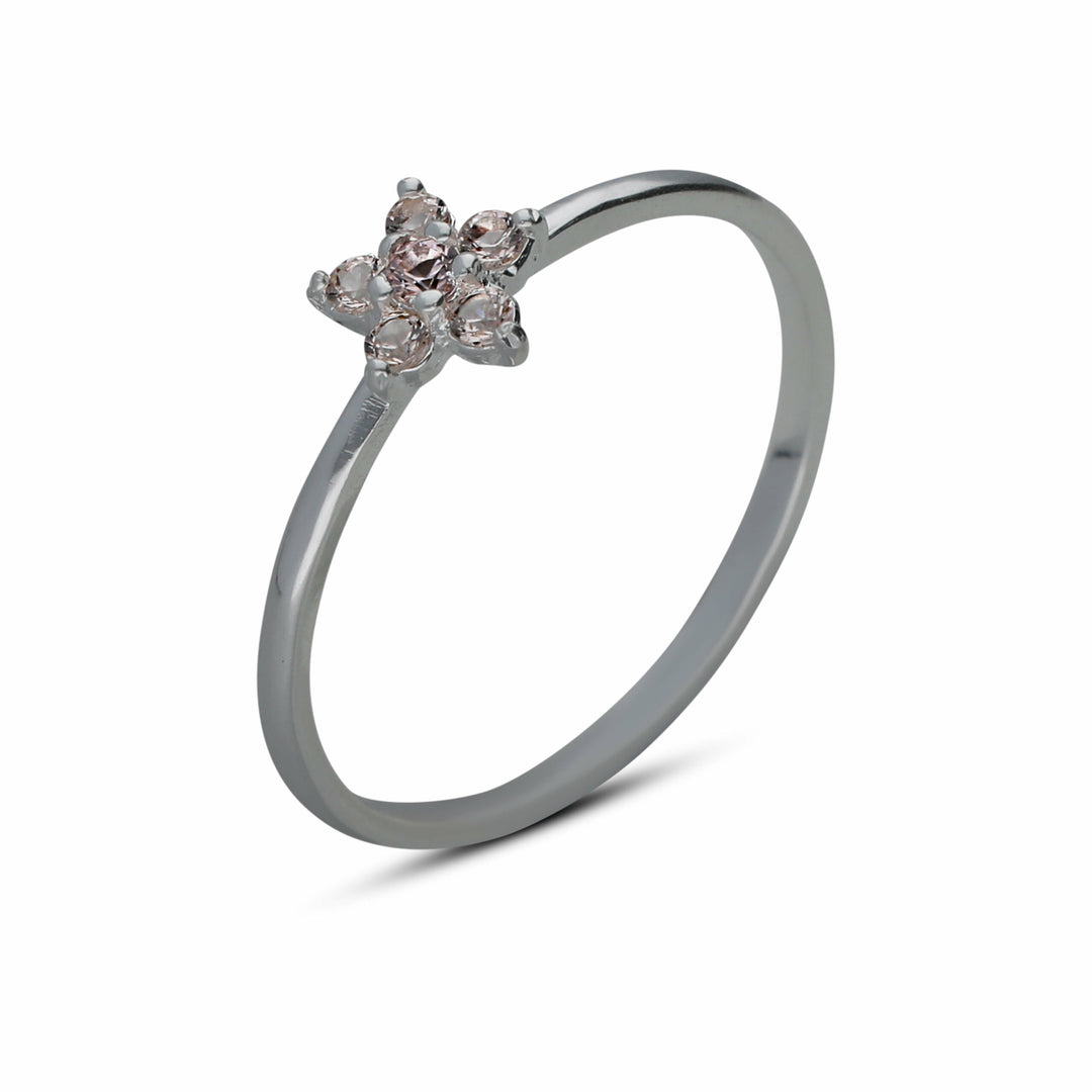 A single flower ring studded with champagne colored crystal stones
