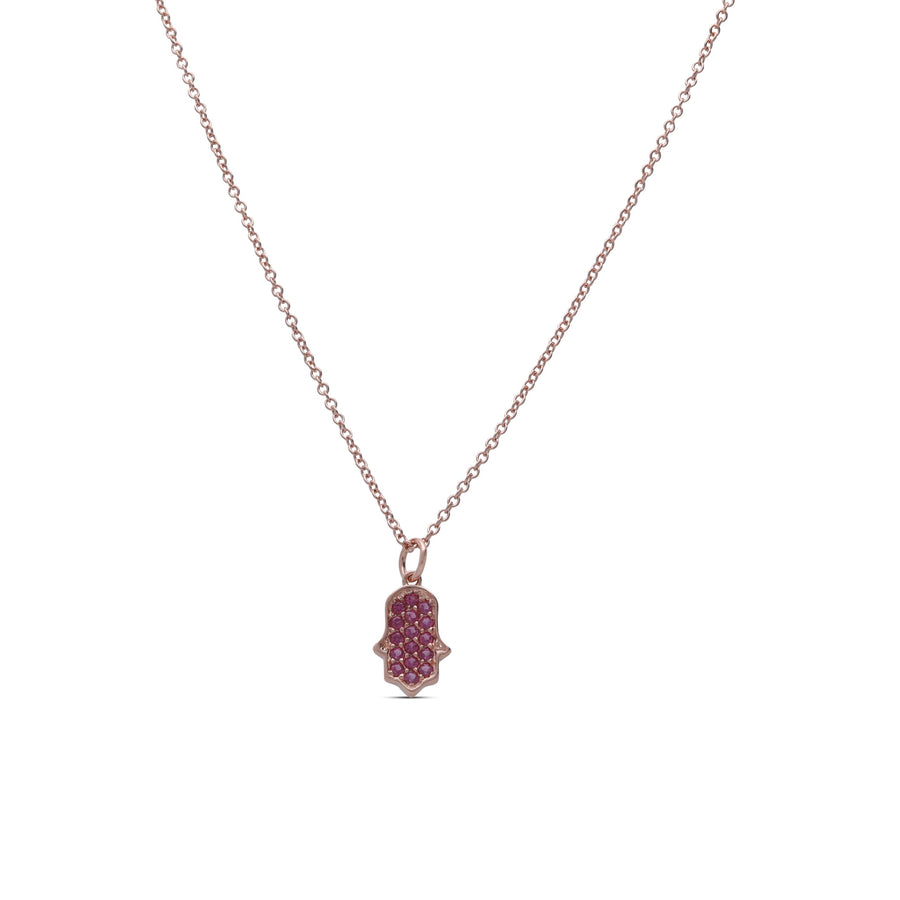 Hamsa pendant necklace studded with ruby colored crystal stones