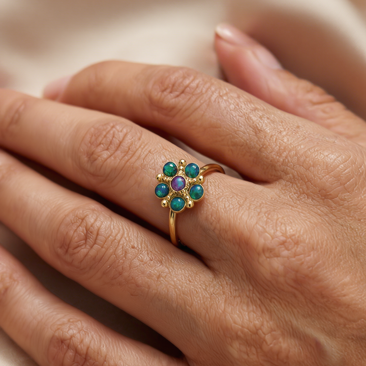 Bloom - A flower ring set with blue-purple lab opal stones