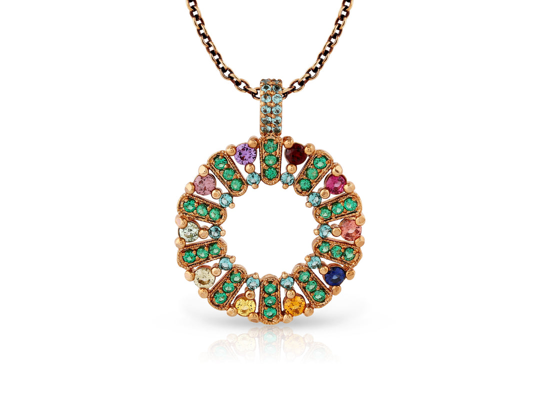 The circle of life necklace is studded with colored crystal stones