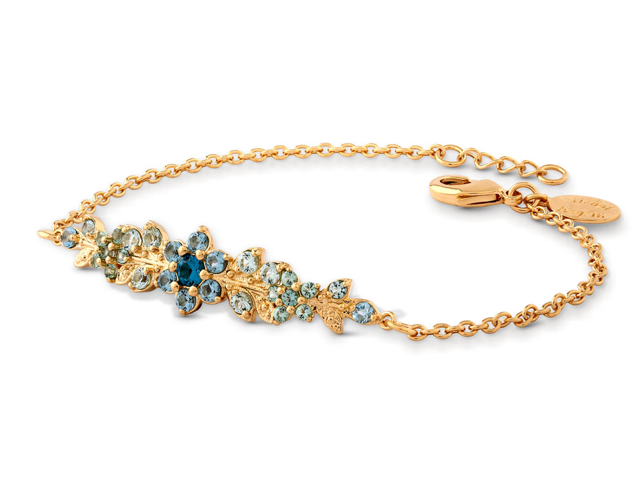 A long flowering branch bracelet studded with turquoise crystal stones