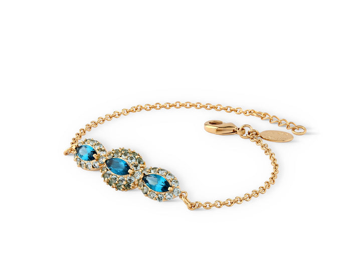 An eye bracelet in the form of a marquise inlaid with turquoise crystal stones