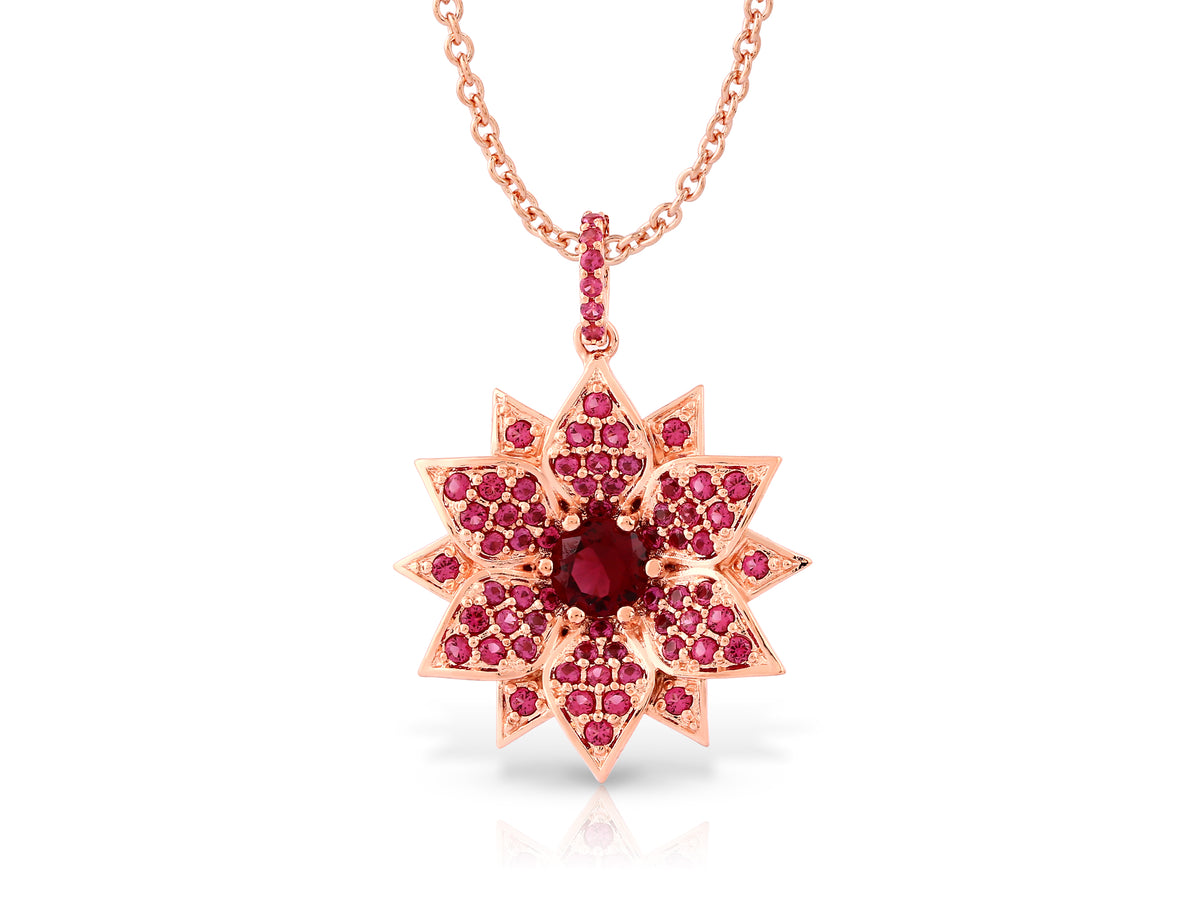 Amaryllis necklace studded with ruby colored crystal stones