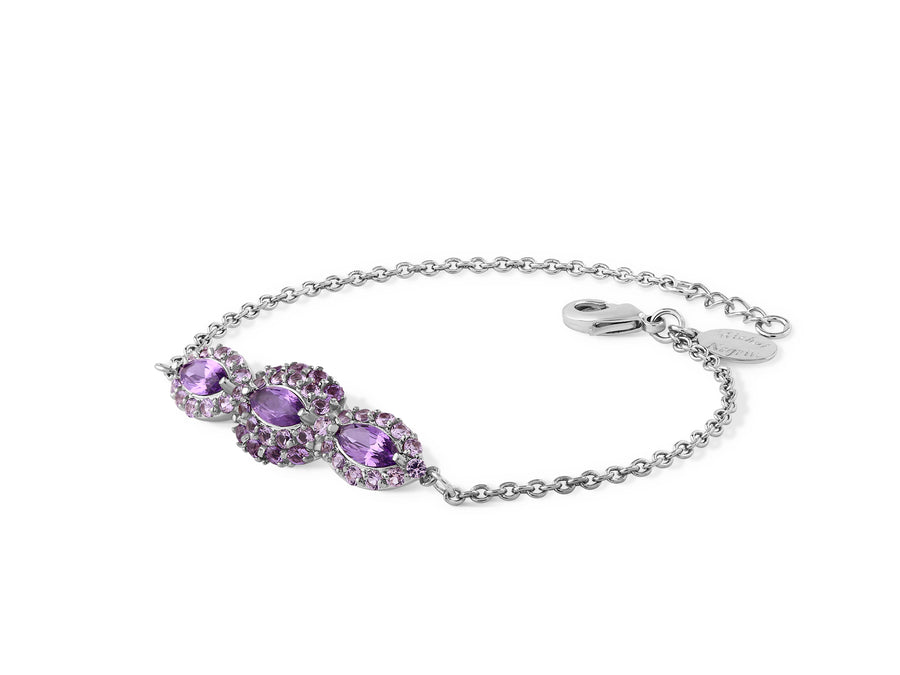An eye bracelet in the shape of a marquise inlaid with purple crystal stones