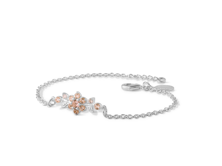 A short flowering branch bracelet studded with champagne colored crystal stones