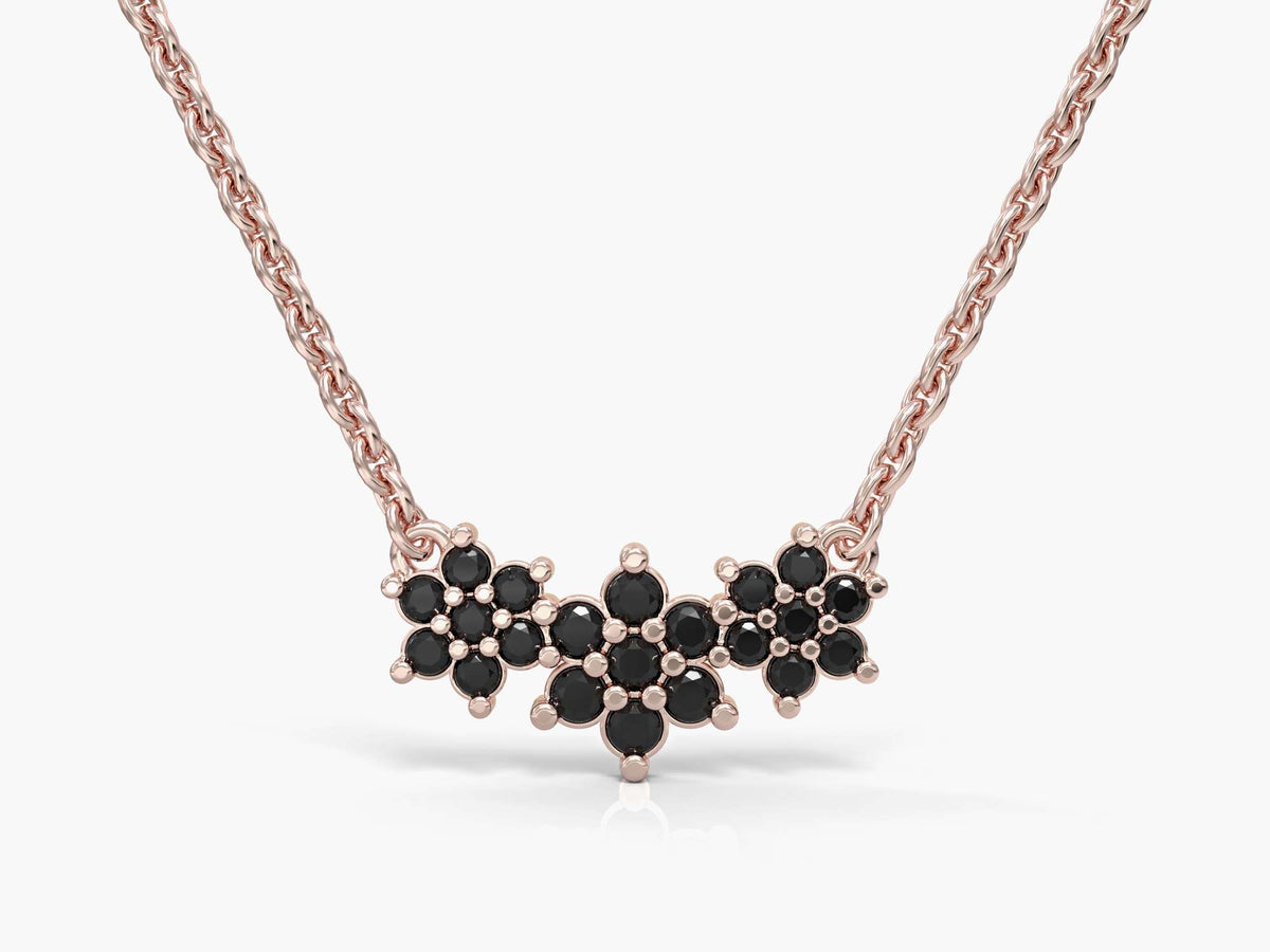 The chain of three adjacent flowers studded with zircons