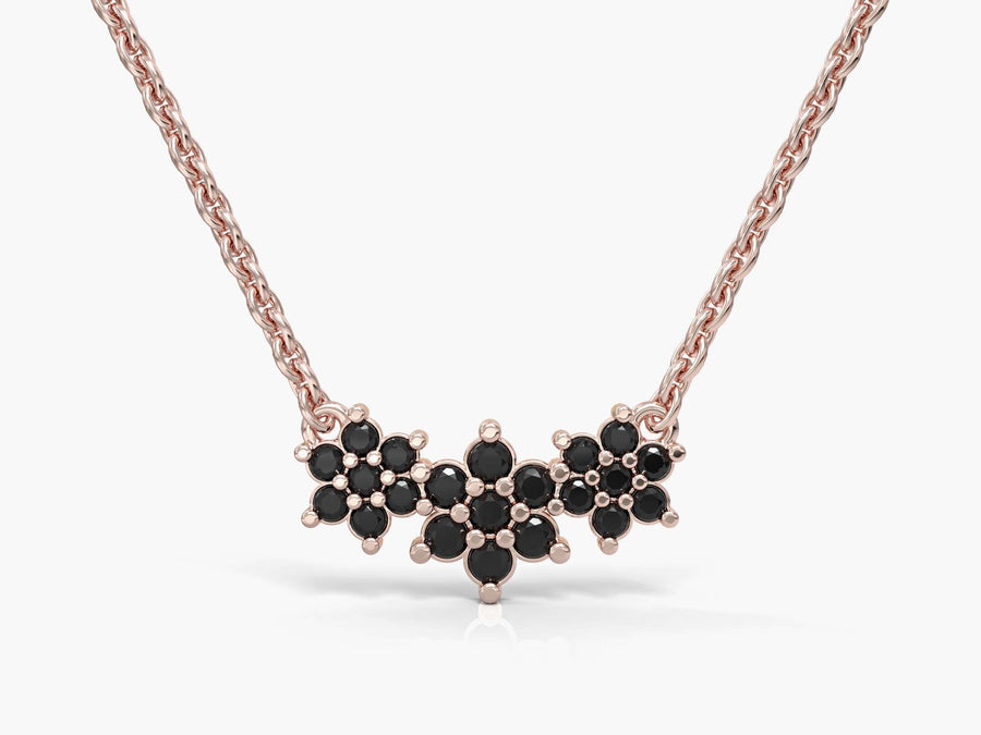 The chain of three adjacent flowers studded with zircons