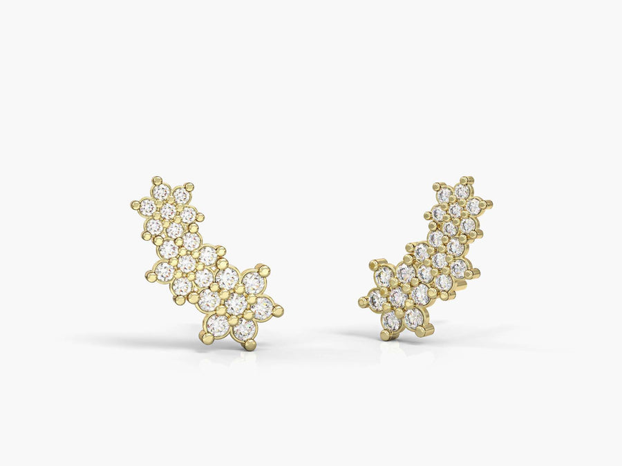 The earrings of the three flowers are attached and studded with zircons