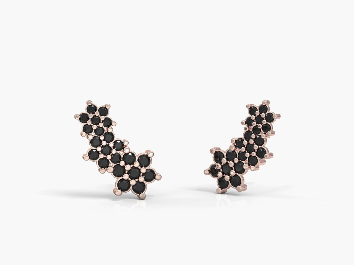 The earrings of the three flowers are attached and studded with zircons