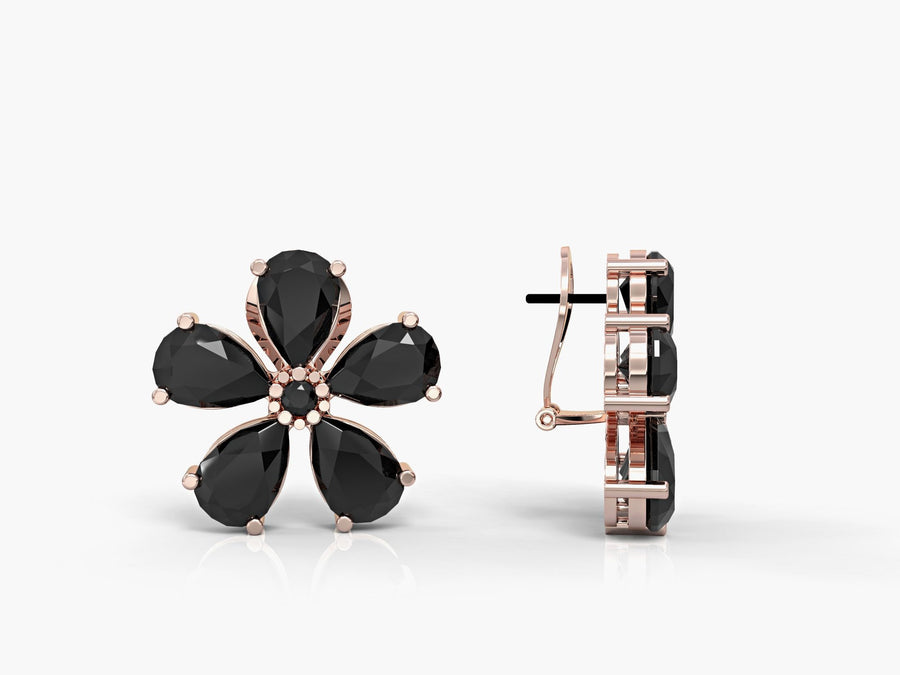 Close-up earrings with a flower of wishes