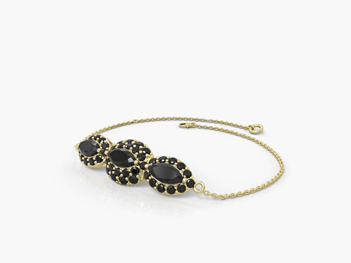 An eye bracelet studded with zircons in the shape of a marquise