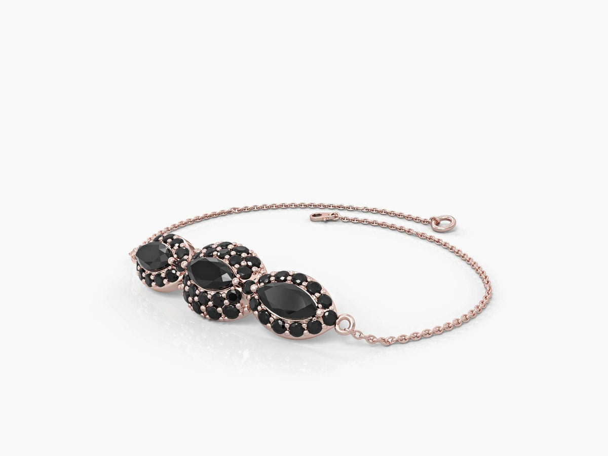 An eye bracelet studded with zircons in the shape of a marquise