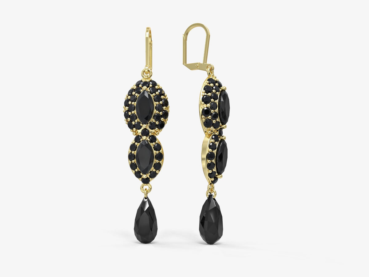 Dangle earrings studded with marquise-shaped zircons