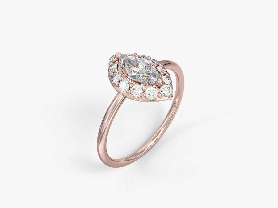 An eye ring studded with zircons in the shape of a marquise