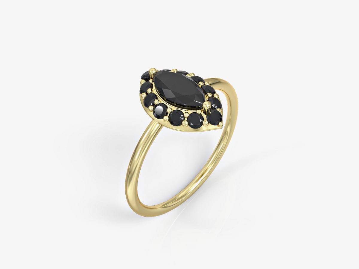An eye ring studded with zircons in the shape of a marquise
