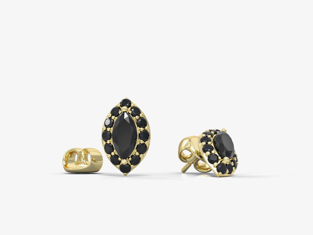 Close-up earrings with eyes studded with marquise-shaped zircons