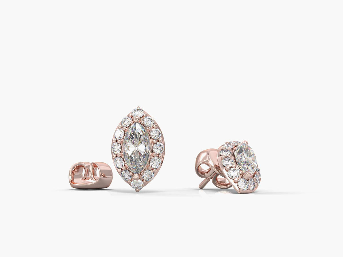 Gold earrings close to eyes