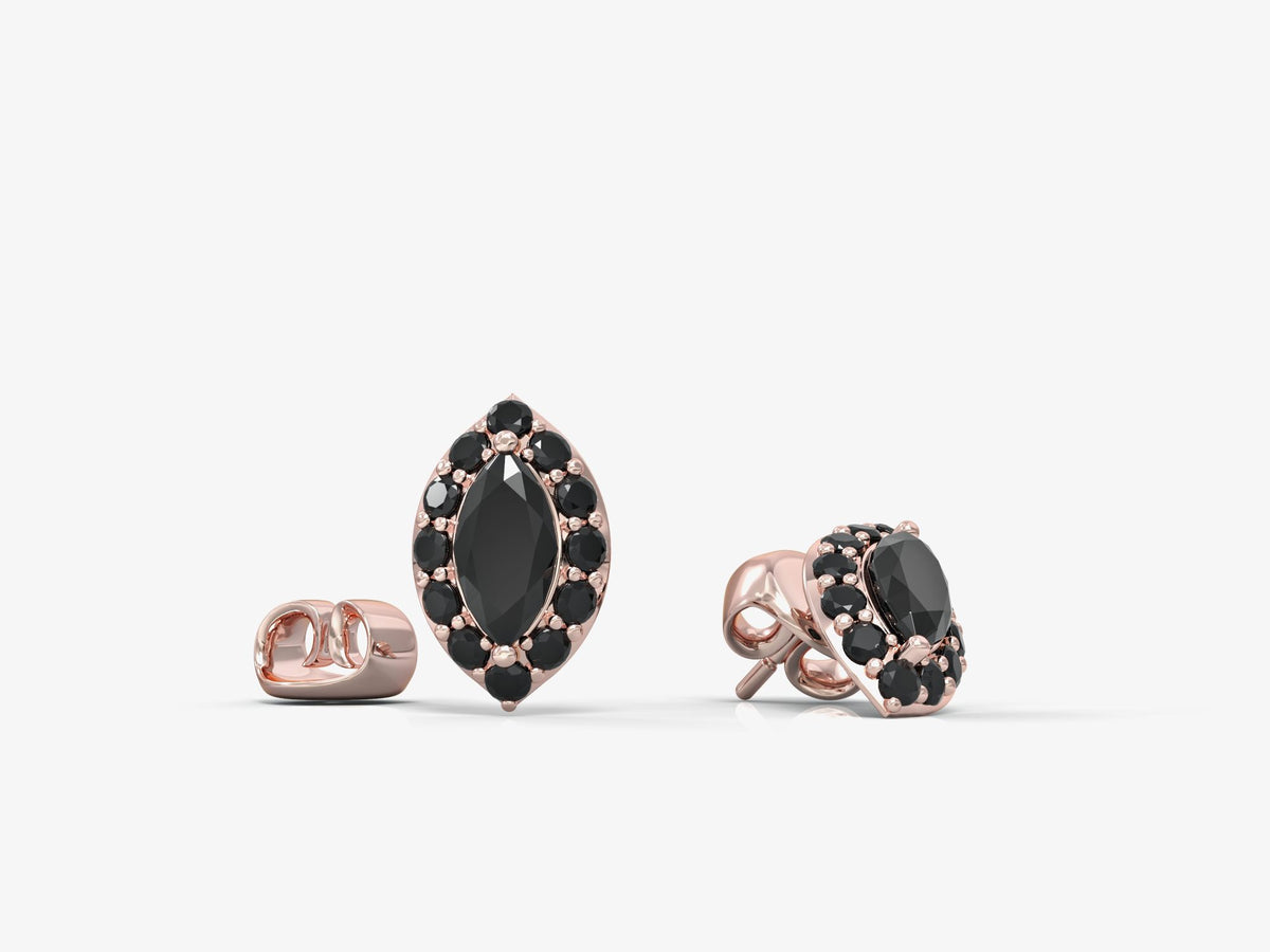 Close-up earrings with eyes studded with marquise-shaped zircons