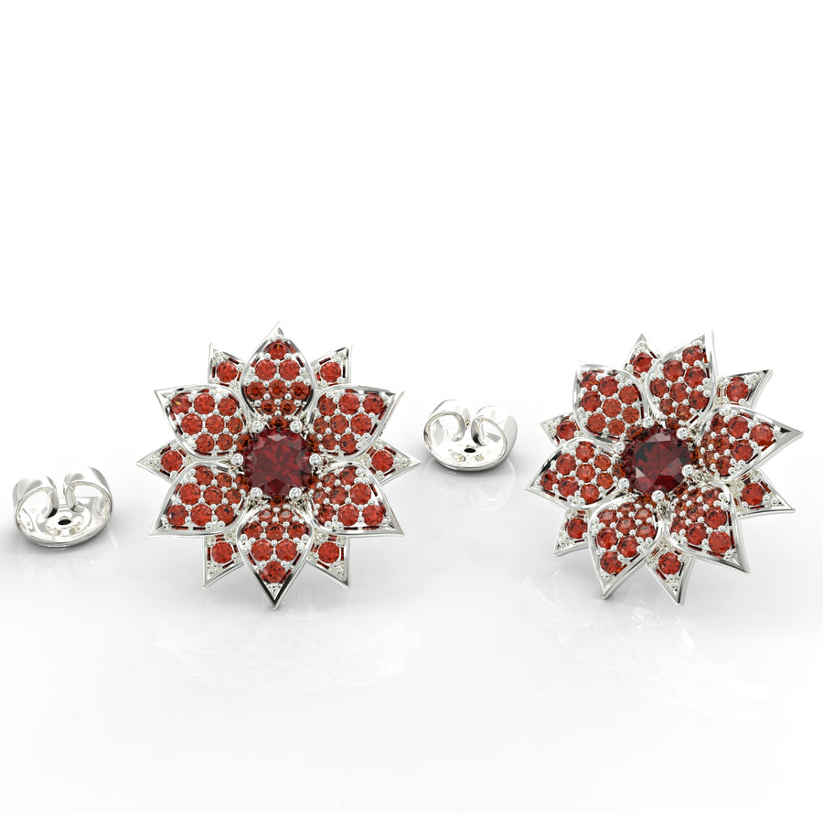 2 attached gold amaryllis earrings studded with crystal stones