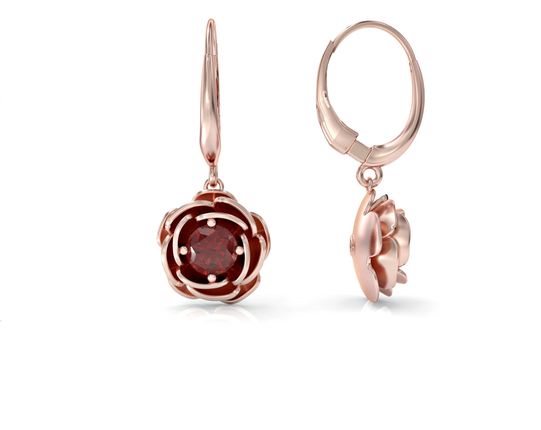 Dangling rose earrings studded with ruby ​​colored crystal stones