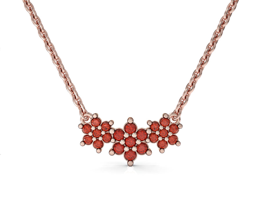 3 14K gold chain with three flowers inlaid with crystal stones
