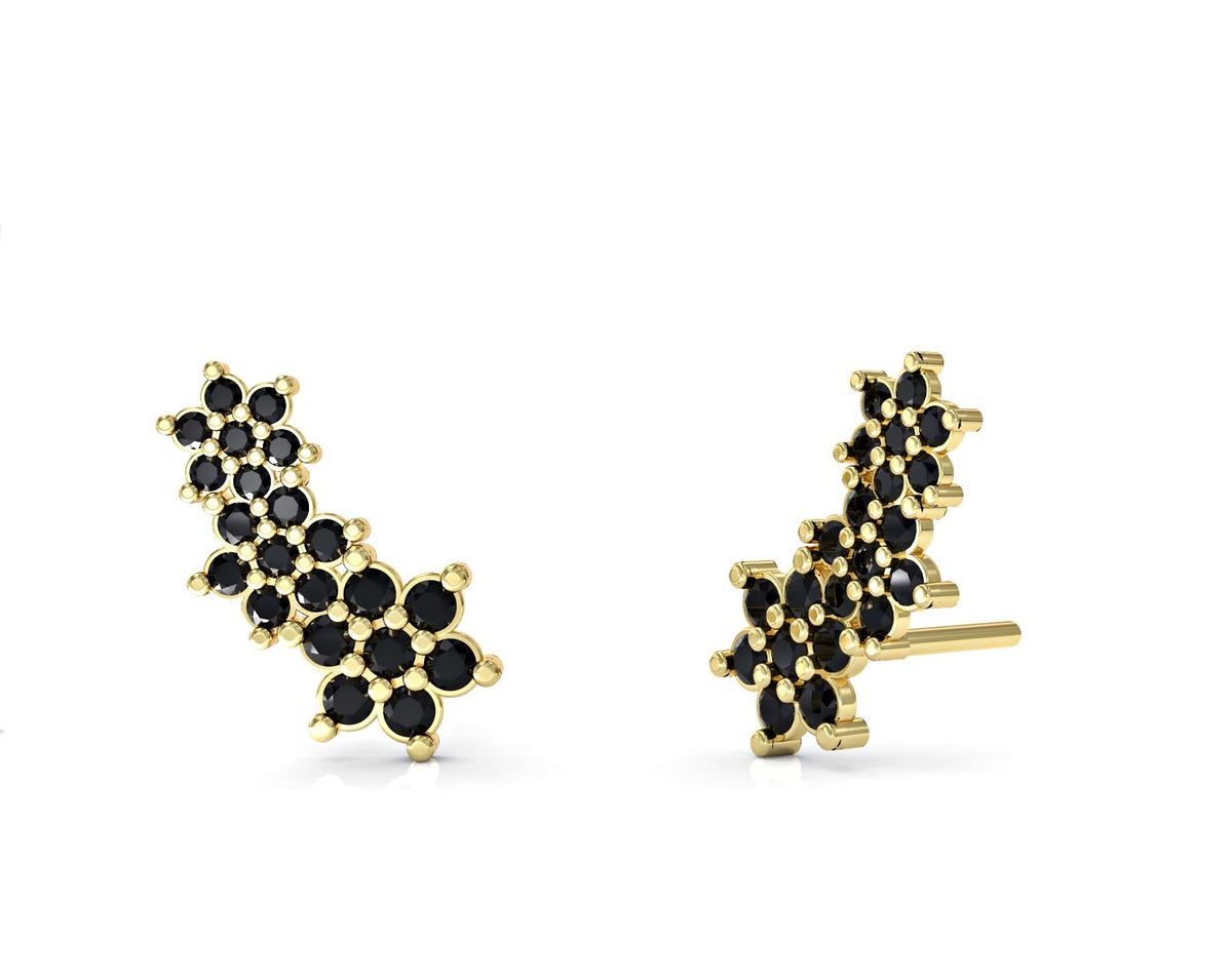 The earrings of the three flowers are attached and studded with zircons