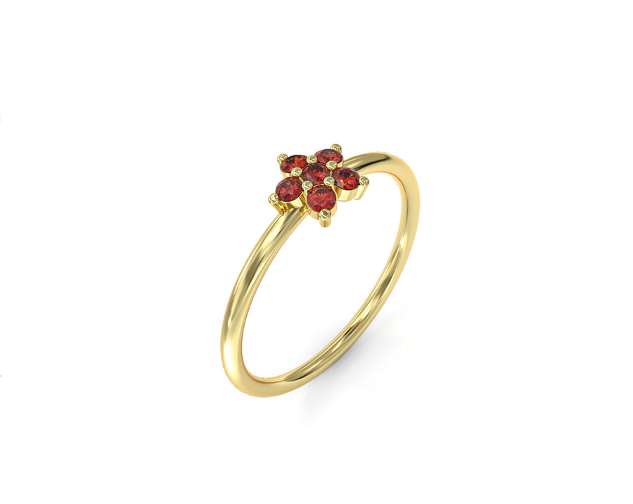 Single flower gold ring studded with rubies