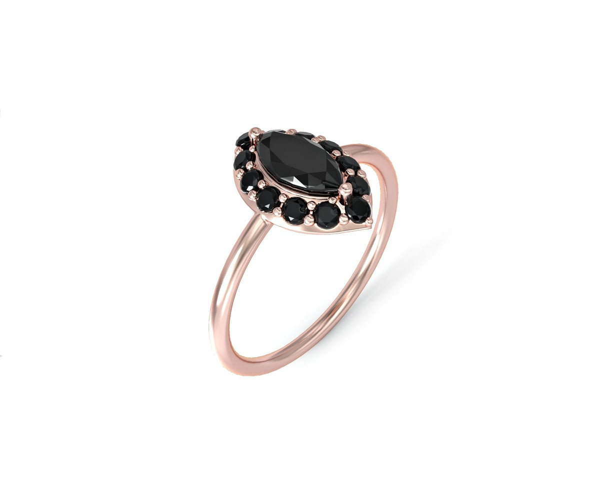 An eye ring studded with zircons in the shape of a marquise