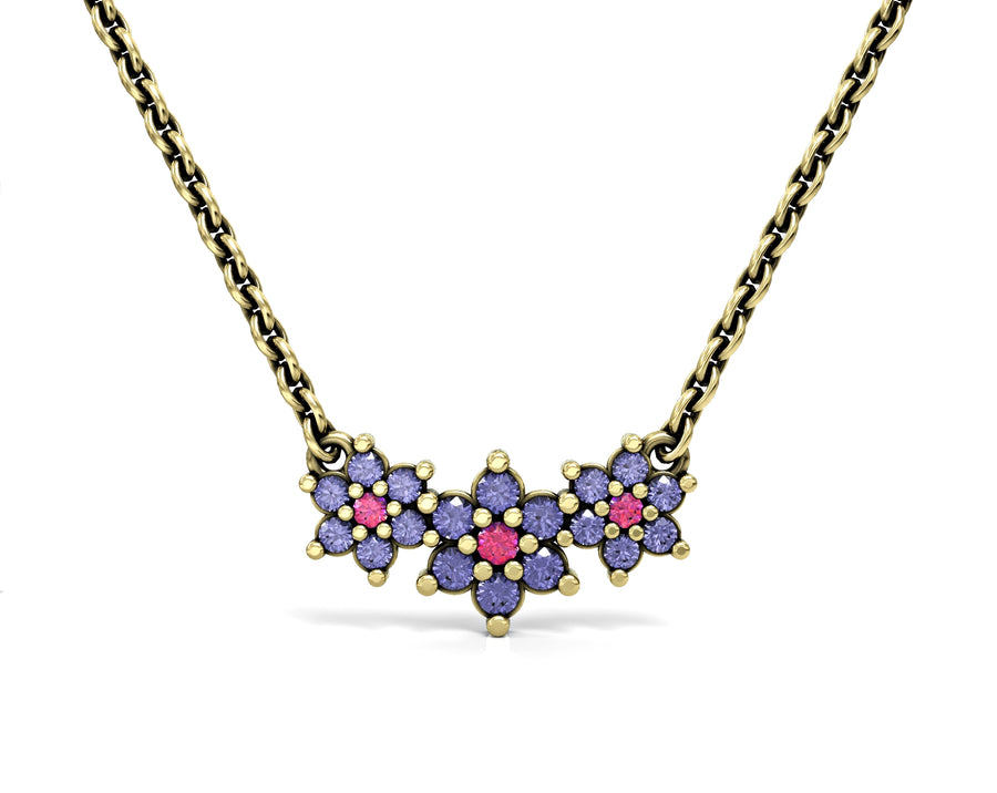 5 14K gold chain with three flowers inlaid with crystal stones