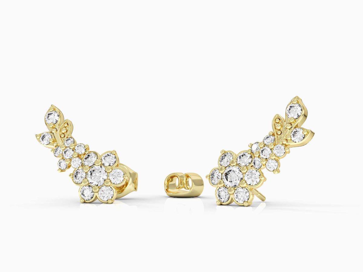 Gold earring climbing flowering branch