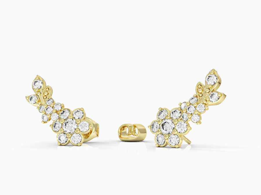 Gold earring climbing flowering branch