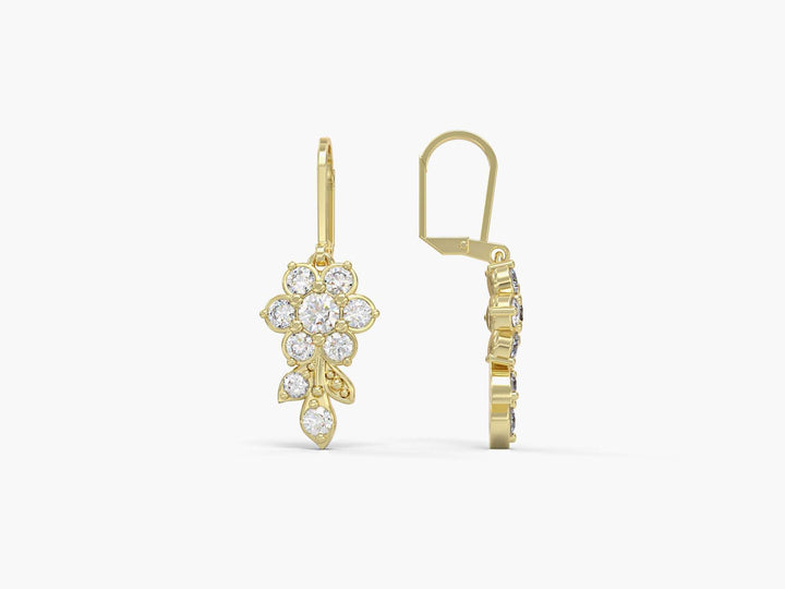 Earrings hanging from a short flowering branch studded with zircons