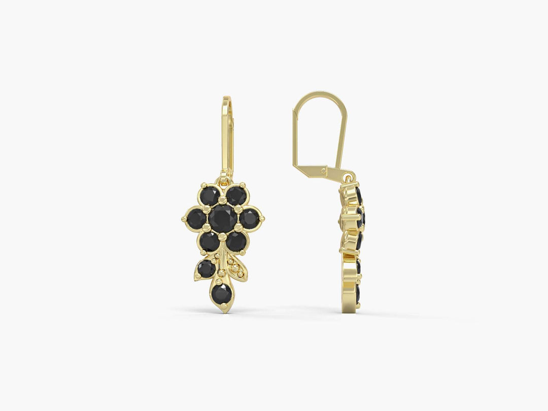 Earrings hanging from a short flowering branch studded with zircons