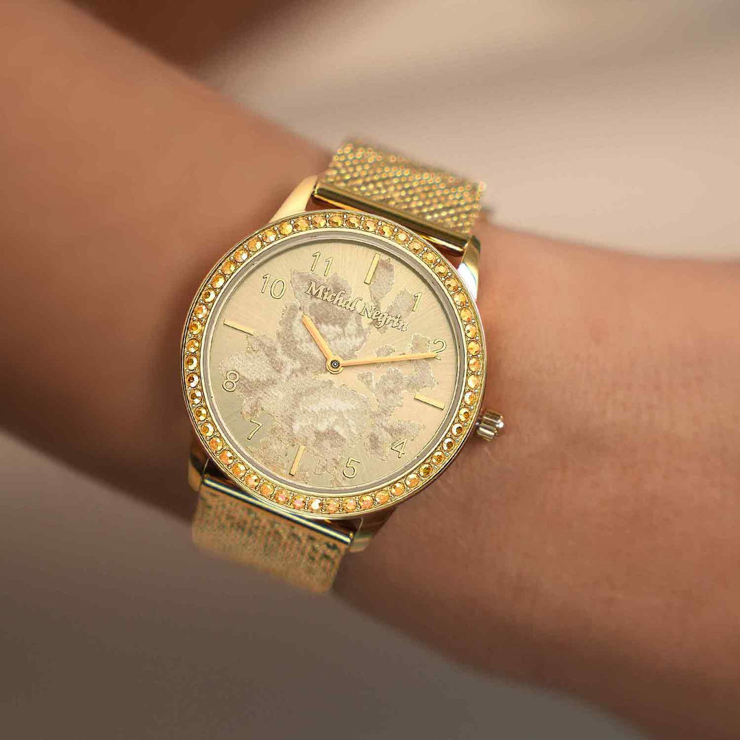Women's wristwatch with 18K antique gold plating and a dial decorated with gold flowers 