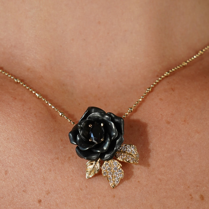 Necklace with a pendant embedded with nano-stellar spinel in a Monarchy enamel finish 