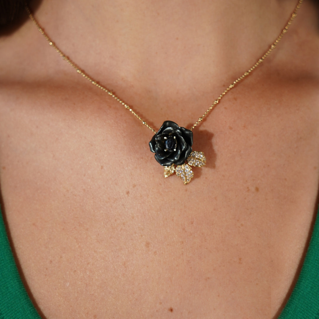 Necklace with a pendant embedded with nano-stellar spinel in a Monarchy enamel finish 