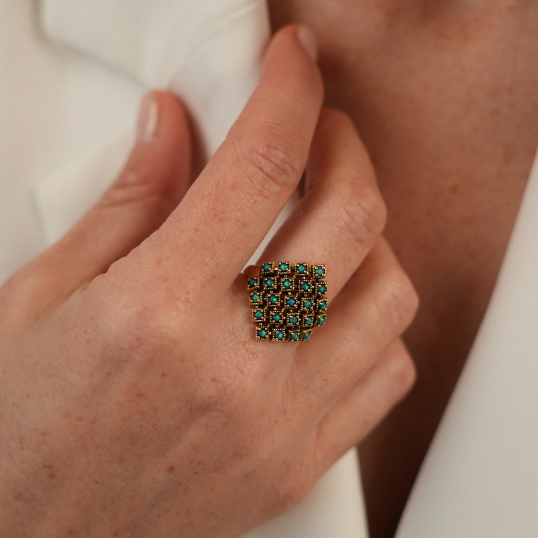 18K antique gold plated gold ring with a small diamond inlaid with synthetic opal stones Volver 