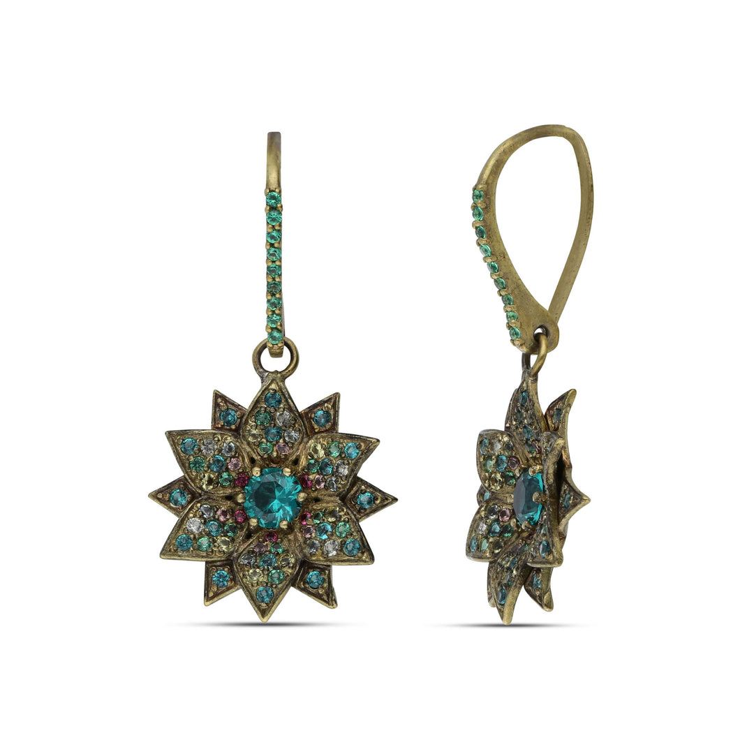 Amaryllis dangling earrings studded with colored crystal stones