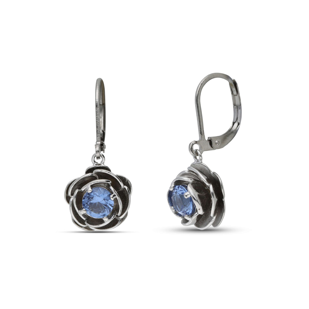Dangling rose earrings studded with blue crystal stones