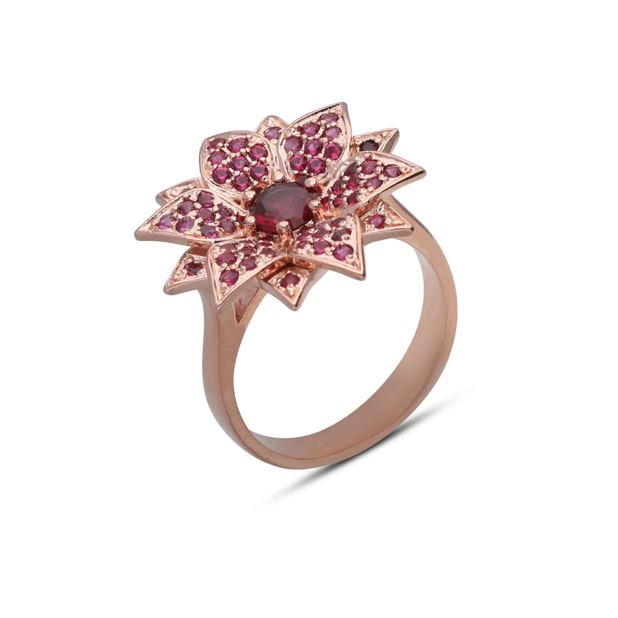 Amaryllis ring studded with ruby colored crystal stones