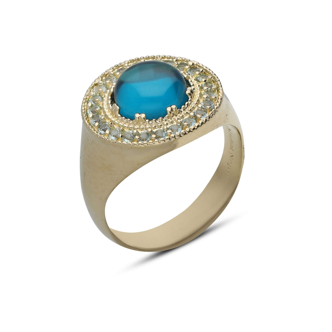 A ray of light ring studded with turquoise crystal stones